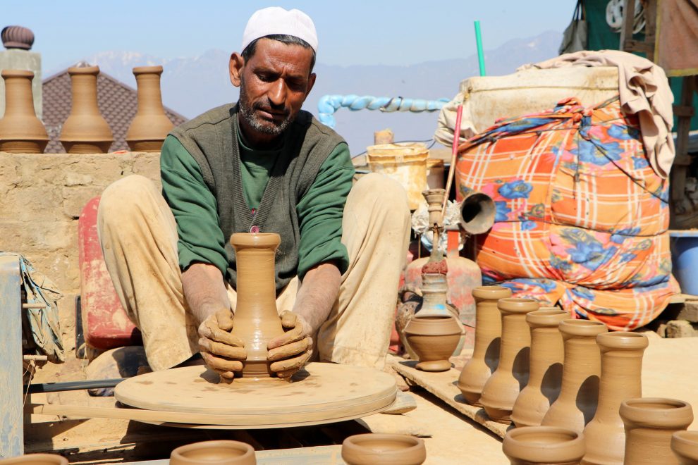 SRINAGAR,: Mohammad Sidiq, a Kashmiri potter from Brain area of Srinagar making traditional musical instrument Tambaknari made from clay which is used in weddings and other happy occasions in the Kashmir valley.