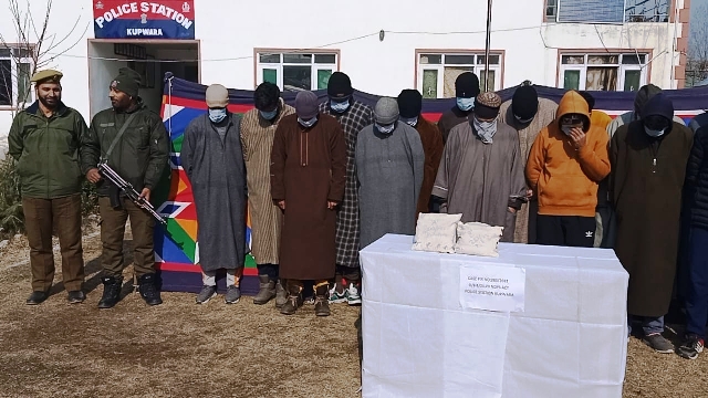 Five policemen among 17drug smugglers arrested in north Kashmir