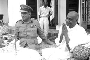 1948. Uneasy Maharaja dons State Military Uniform in meeting with Patel